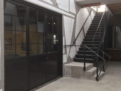 Custom Bi-folding Door and Stairs with Sculptural Guardrail, Space Annex Gallery, Denver, 2019